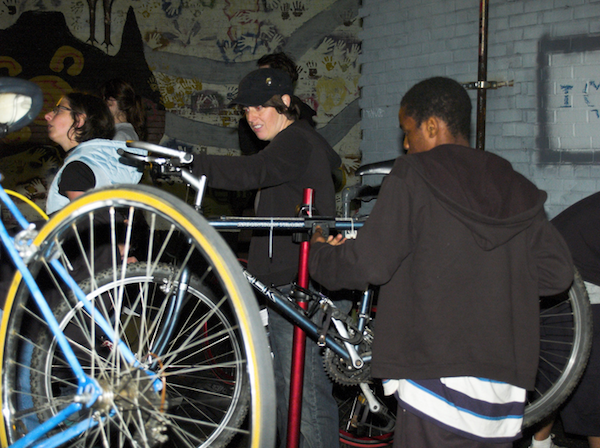 The goal of a bike kitchen is not just to get people in the door, but to keep them coming back and contributing to the community. Credit: TimothyJ (CC)