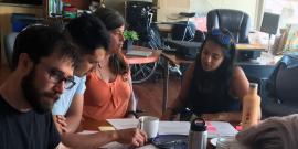 People meeting around a table.