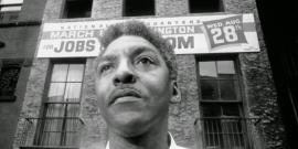 Bayard Rustin outside the headquarters of the March on Washington.