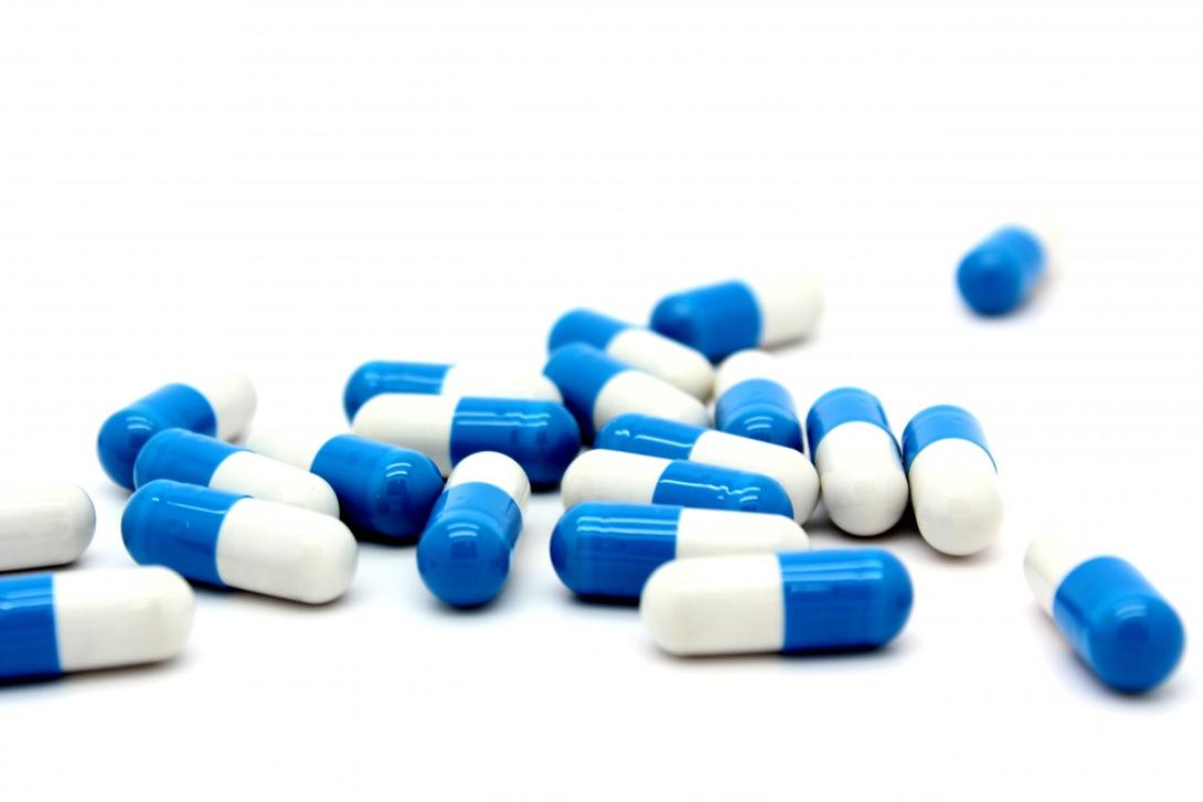 Blue and white pills.