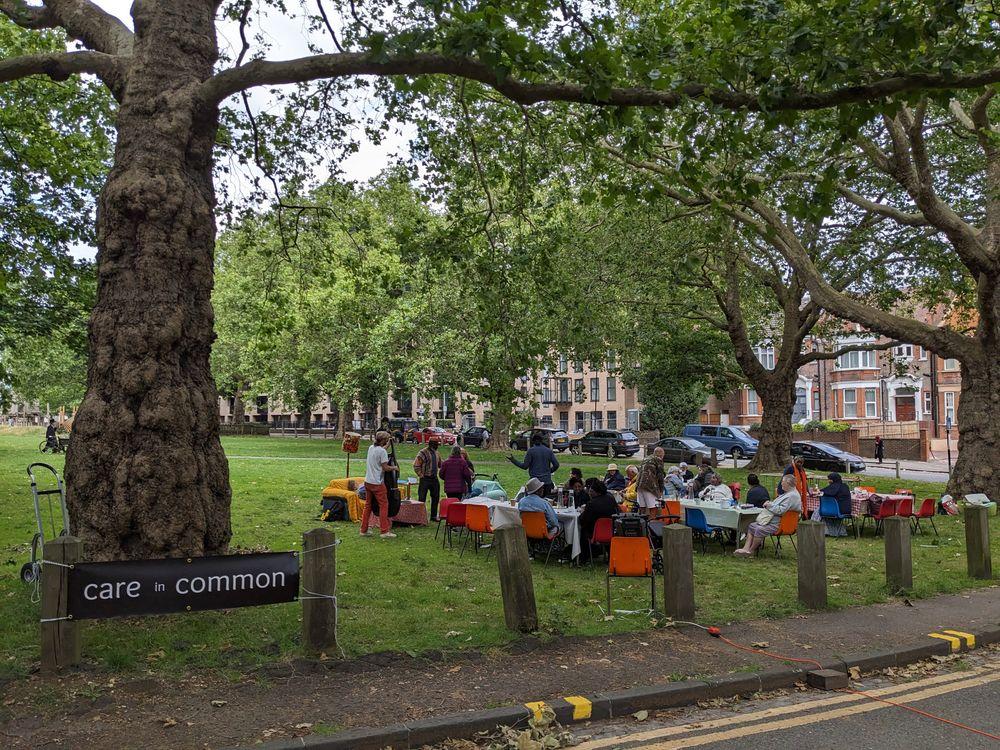 Care Commons group meets in a park.