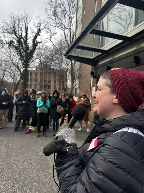 Mary, Park East resident, talks to the group.