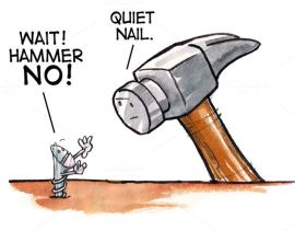 Hammer preparing to pound in a screw.