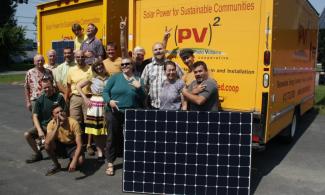 Worker-owners of Pioneer Valley Photo Voltiacs.