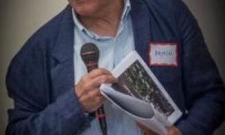 Armin Isasti speaking at the 2015 Union Co-op Symposium.