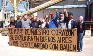 Photo posted by workers in the Greek recuperated business Viome on Facebook, April 15, 2014. The sign reads “half of our heart can be found in Buenos Aires. Viome stands in solidarity with Bauen.”