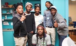 Tightshift member apprentices and supporters at Tightshift Laboring Cooperative’s launch in December 2016 at Impact Hub DC. Adriel Fogle, Delonte Wilkins, Noreil Gorham, Donnell Sims, Keith Gaffney, Nicholas Gorham (bottom row). Photo by Samira Rashid, <a href="http://www.srashid.com/" target="_blank">SR Photography</a>.